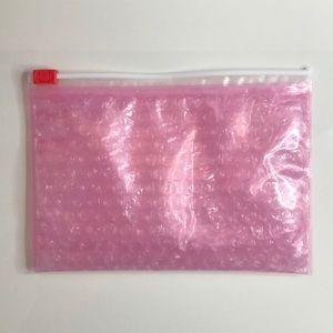 2 Small Pink Glossier Pouches
